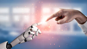 An image of a doctor's hand and a robot's hand 