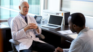 An image of a doctor talking to a patient