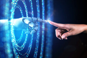 A futuristic finger touches a human finger 