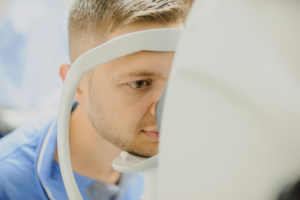 image courtesy of Canva, man using OCT