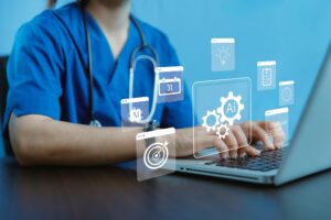 A medical professional using a laptop with AI icons